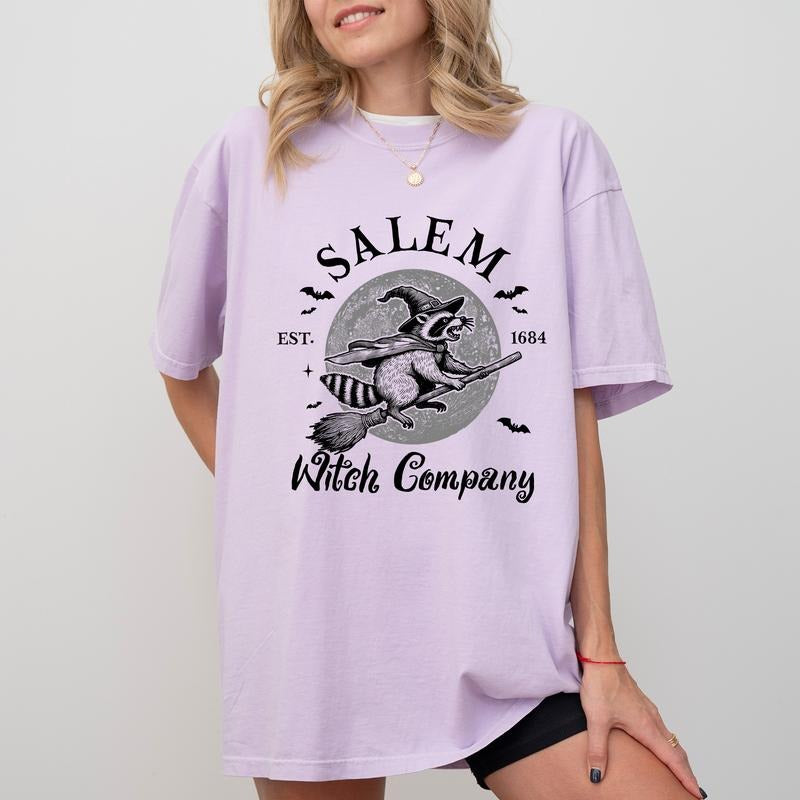 Comfort Colors Salem Witch Company Shirt, Funny Witchy Raccoon Graphic Printed Tee, Meme Halloween Unhinged Shirt, Funny Witch Halloween Shirt, Fall T-shirt For Women, Salem Trip Shirt, Women's Top, Womenswear, Cotton Fabric Relaxed Fit Chic Style